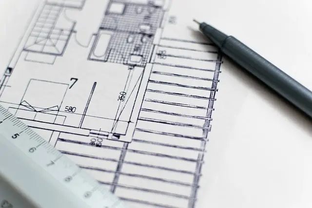 A Pen And A Ruler On An Architecture Blueprint