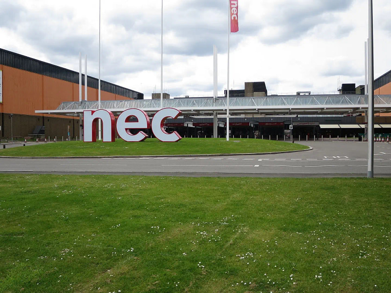 NEC Birmingham sign outside on the grass verge.