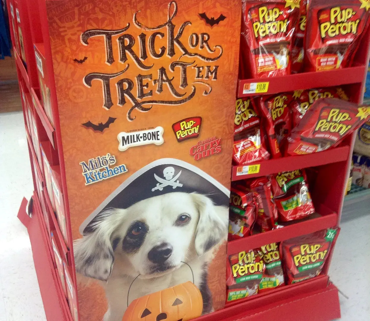 A Cardboard Display Of Halloween-Themed Dog Treats.